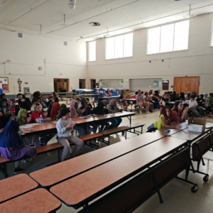 photo of children sitting in a cafeteria